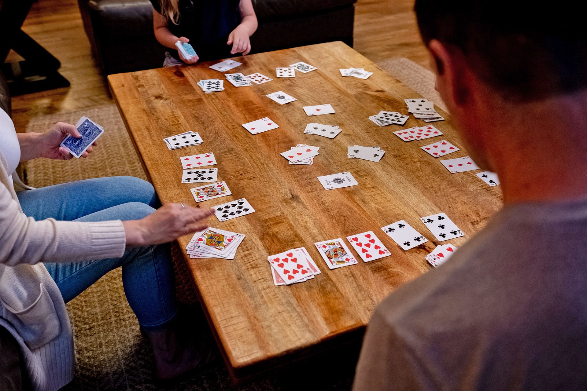 Playing cards in a cabin in Beavers Bend