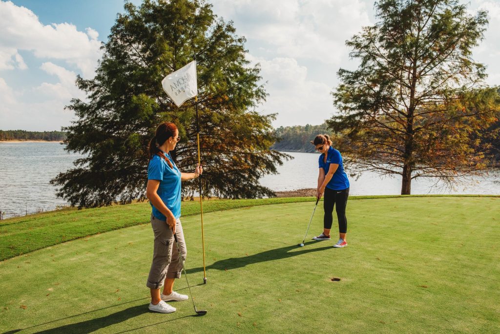 Hitting the links at Cedar Creek Golf Course on the shores of Broken Bow Lake in McCurtain County Oklahoma.