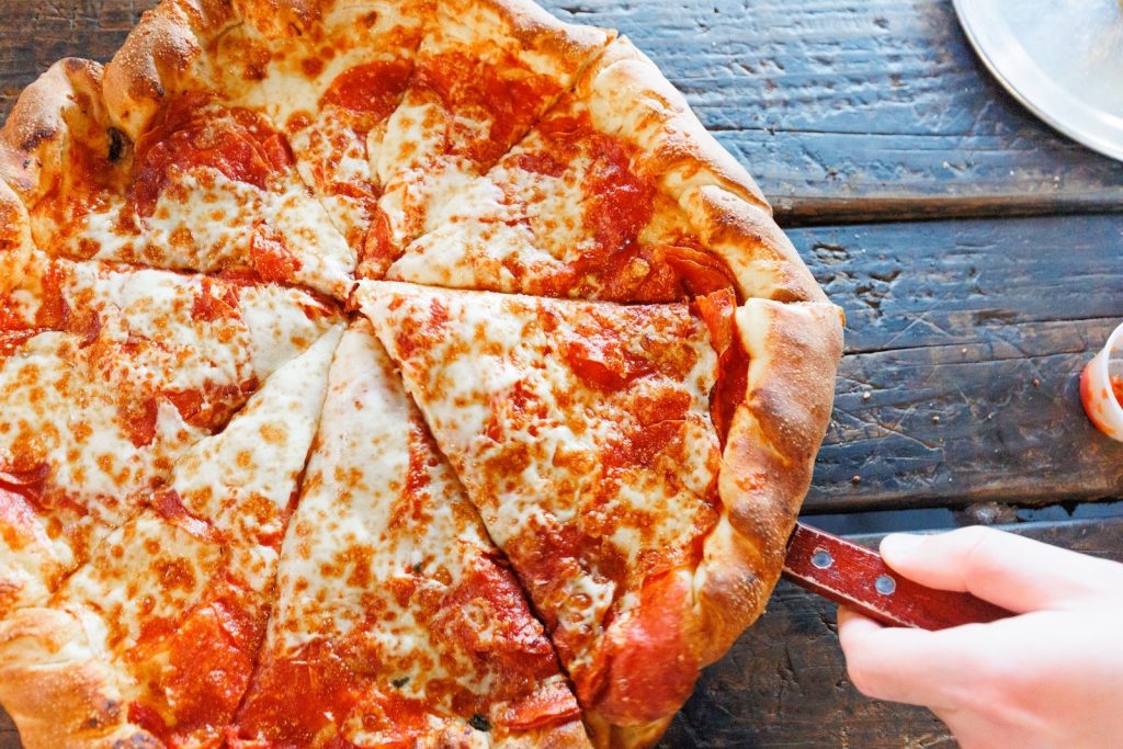 A freshly sliced pepperoni pizza at the Grateful Head