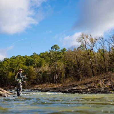 Morgan "Mo" Prater fly fishing for rainbow and brown trout on the Lower Mountain Fork River in Beavers Bend. Winter fishing.