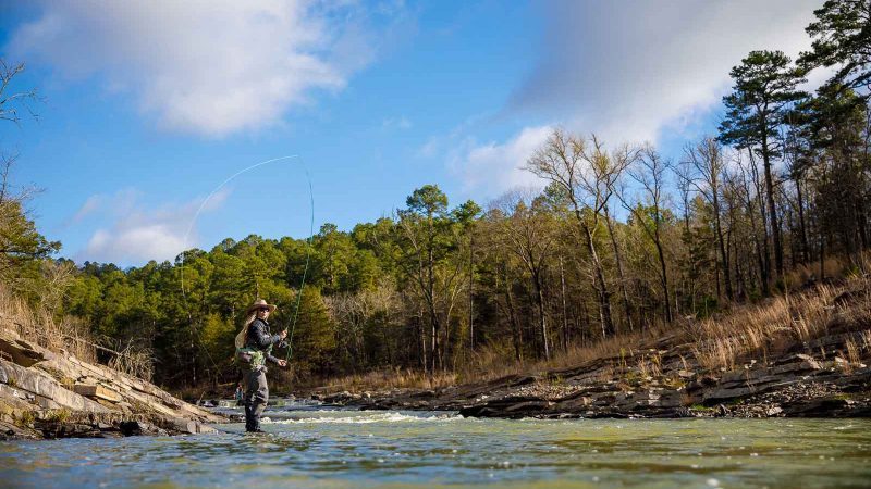 Morgan "Mo" Prater fly fishing for rainbow and brown trout on the Lower Mountain Fork River in Beavers Bend. Winter fishing.